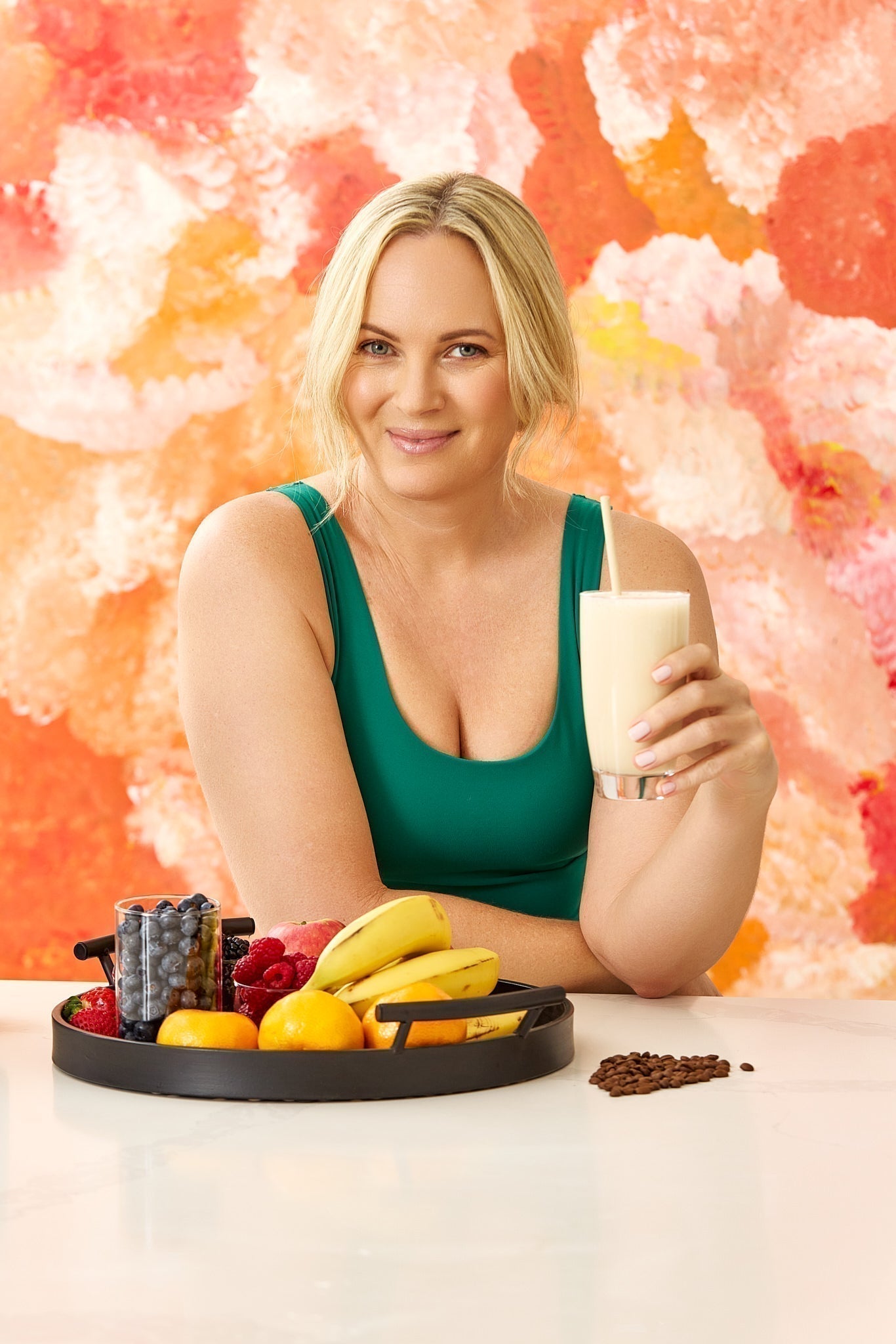 Lady holding Healthy Trim shake in a glass